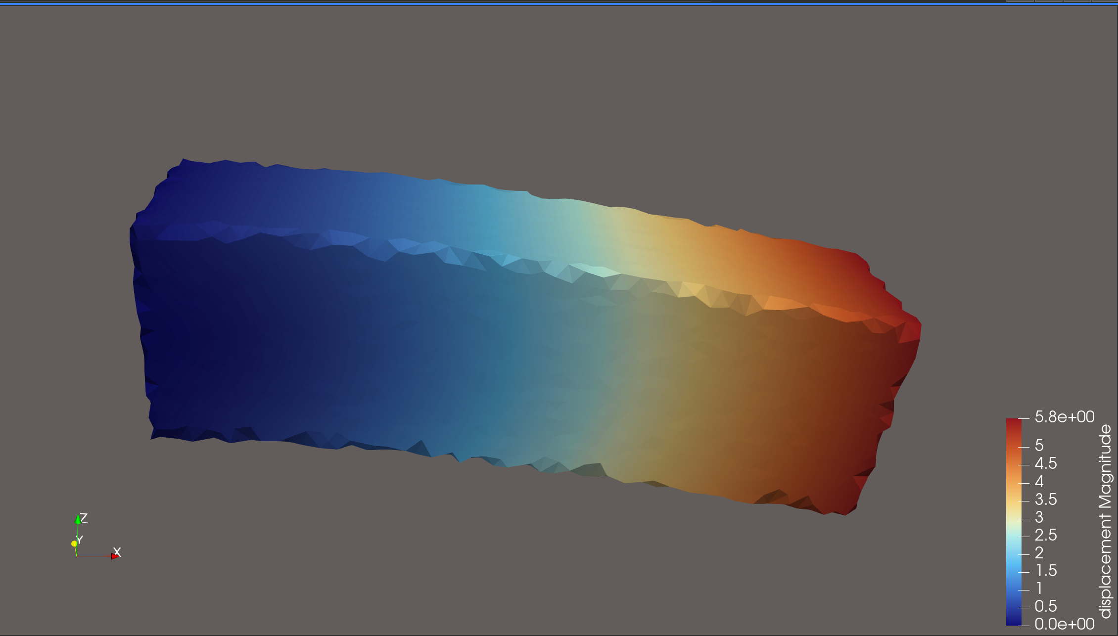 ParaView screenshot of the deformed cantilever beam colored by displacement magnitude