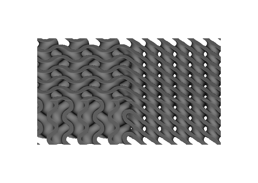 Close-up of a gyroid-to-Schwarz-D field-mixing boundary